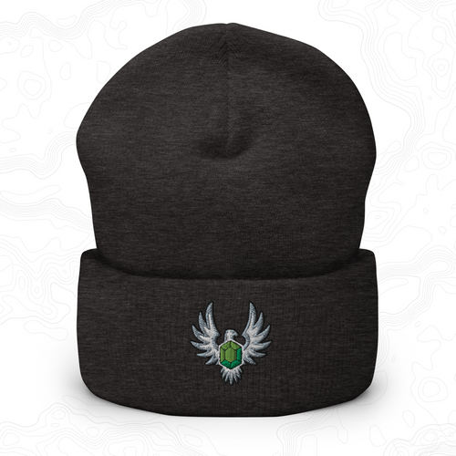 Dark gray Elven Stone cuffed beanie with a green gemstone framed by silver wings embroidered on the front.