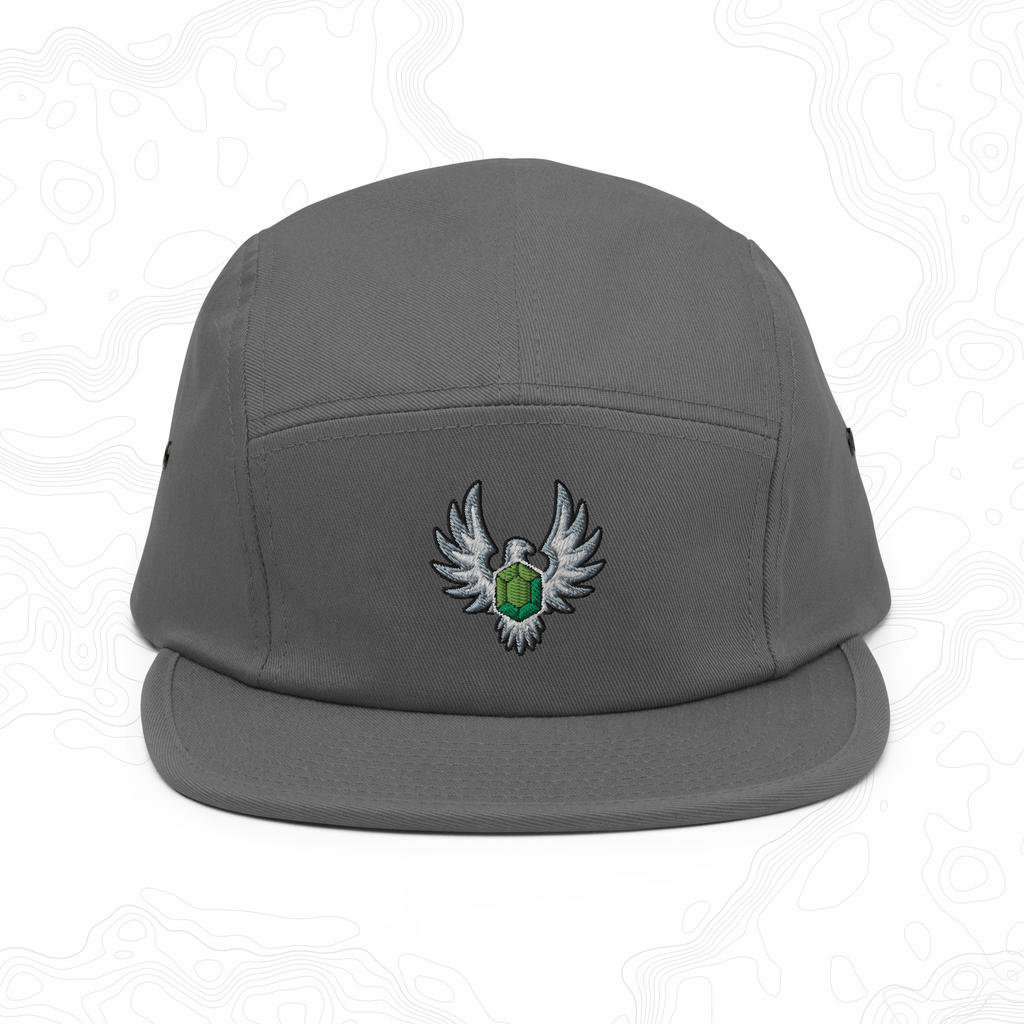 Dark gray Elven Stone five-panel cap with a green gemstone framed by silver wings embroidered on the front.